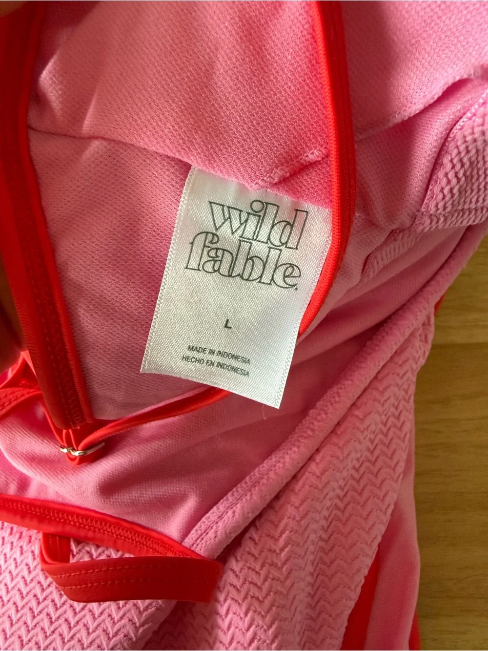 Pink One-Piece Swimsuit with Red Trim